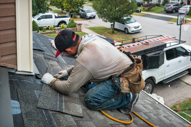 Professional Roofing technician working in Spring Creek, PA